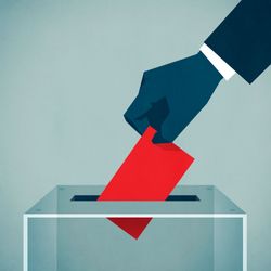Blue hand dropping a red voting slip into a ballot box