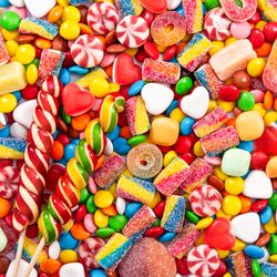 assorted jelly and hard candies and lollipops in a multitude of colours
