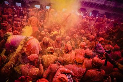 People in the Indian city of Vrindavan celebrate Holi, known as the Festival of Colours.