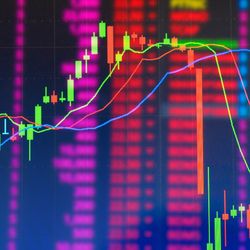 Double exposure Technical candlestick price chart showing up and down trend, volatility, panic sell, red selling stock ticker trading data on computer screen background Financial business concept