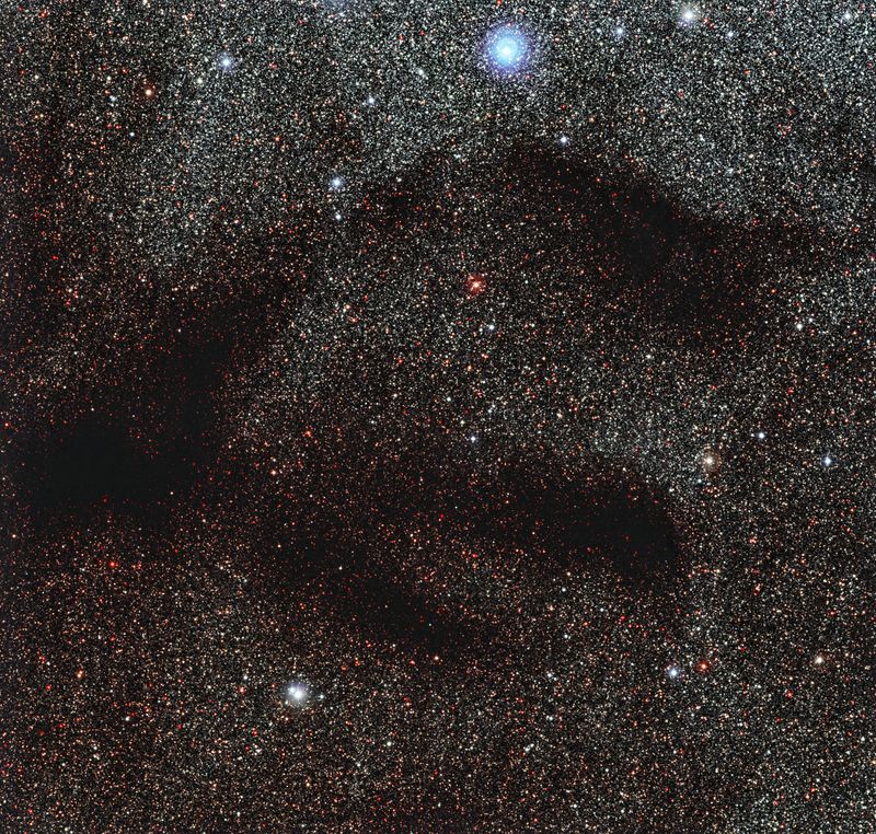 Dark molecular clouds like LDN 1768, shown here, are hard to see in visible light hidden behind dense clouds of dust. 