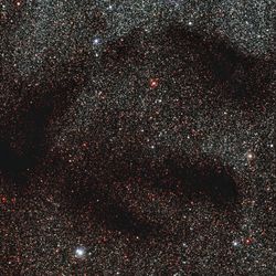 Dark molecular clouds like LDN 1768, shown here, are hard to see in visible light hidden behind dense clouds of dust. 