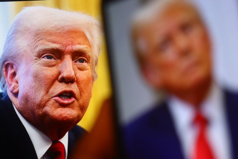 Donald Trump next to an out of focus photo of Donald Trump