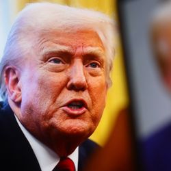 Donald Trump next to an out of focus photo of Donald Trump