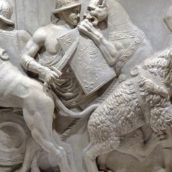 Relief of gladiators fighting lions