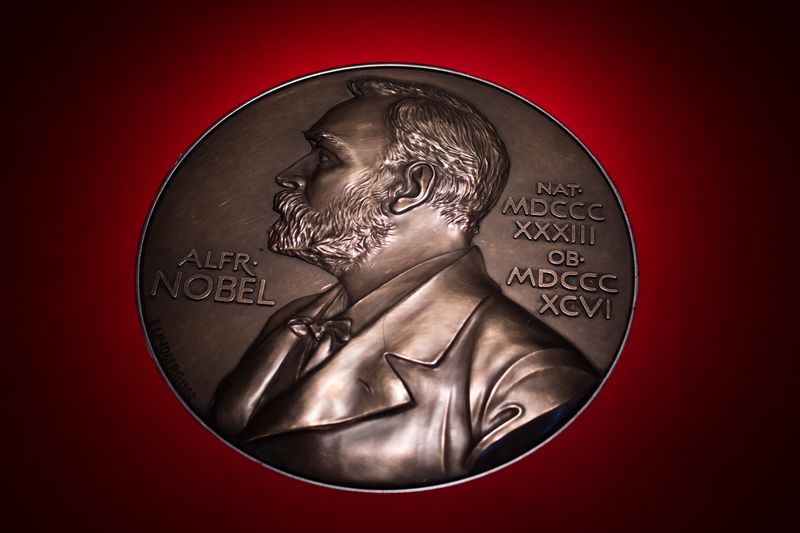 Stockholm, Sweden - January 2022. Nobel Prize Museum. Portrait of Alfred Nobel on a silver "coin" - close up.