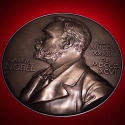 Stockholm, Sweden - January 2022. Nobel Prize Museum. Portrait of Alfred Nobel on a silver "coin" - close up.