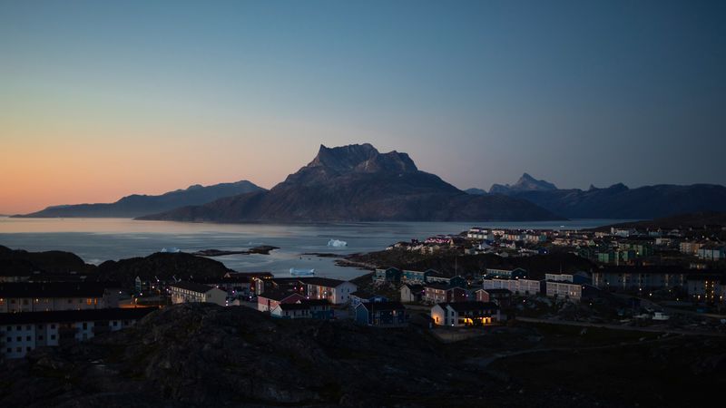 Sunsets over the capital of Nuuk in Greenland.