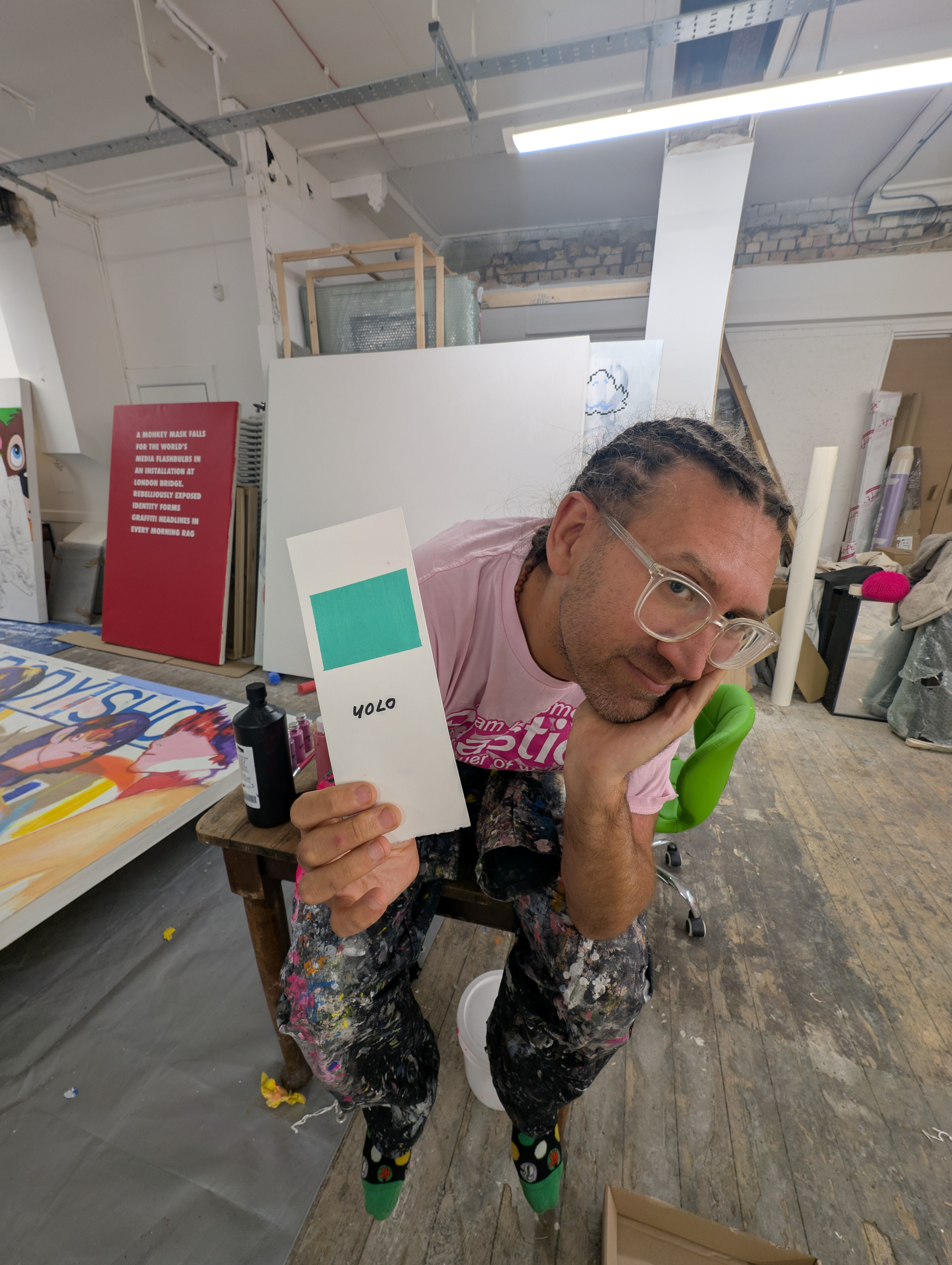 Stuart Semple, artist and colorful provocateur, poses with a sample of his new paint YOLO. Stuart Semple, artist and colorful provocateur, poses with a sample of his new paint YOLO.