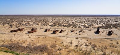 Rusty ships lying on the seabed of the dried-up Aral Sea in Moynaq (or Muynak), a former fishing town in Karakalpakstan, Uzbekistan