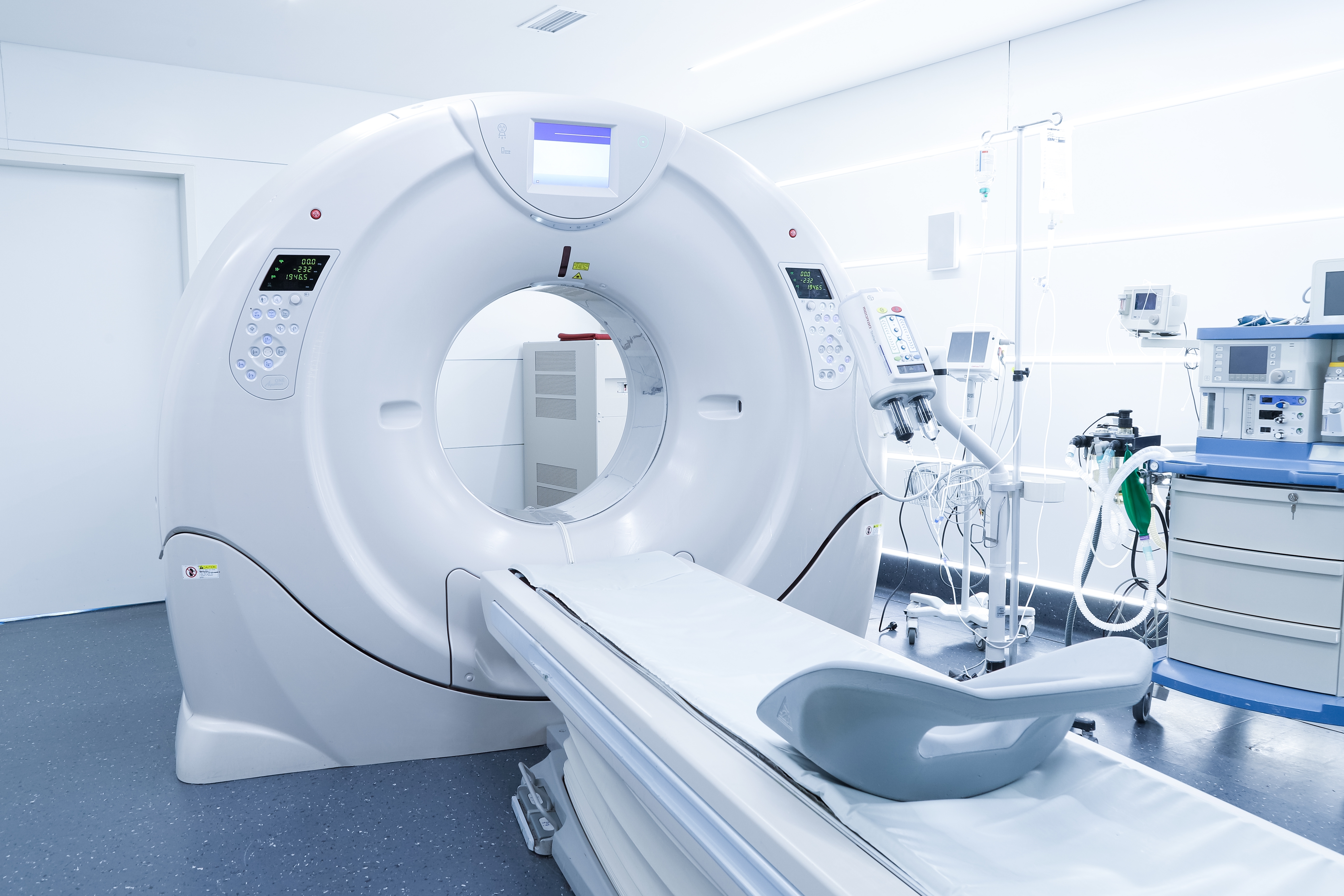 photograph of a CT scanner in a hospital photograph of a CT scanner in a hospital