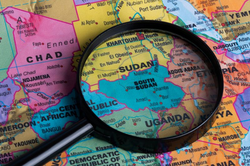 Map of South sudan through magnifying glass.Close-up
