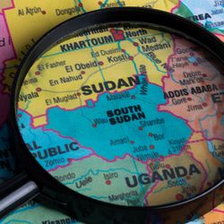 Map of South sudan through magnifying glass.Close-up