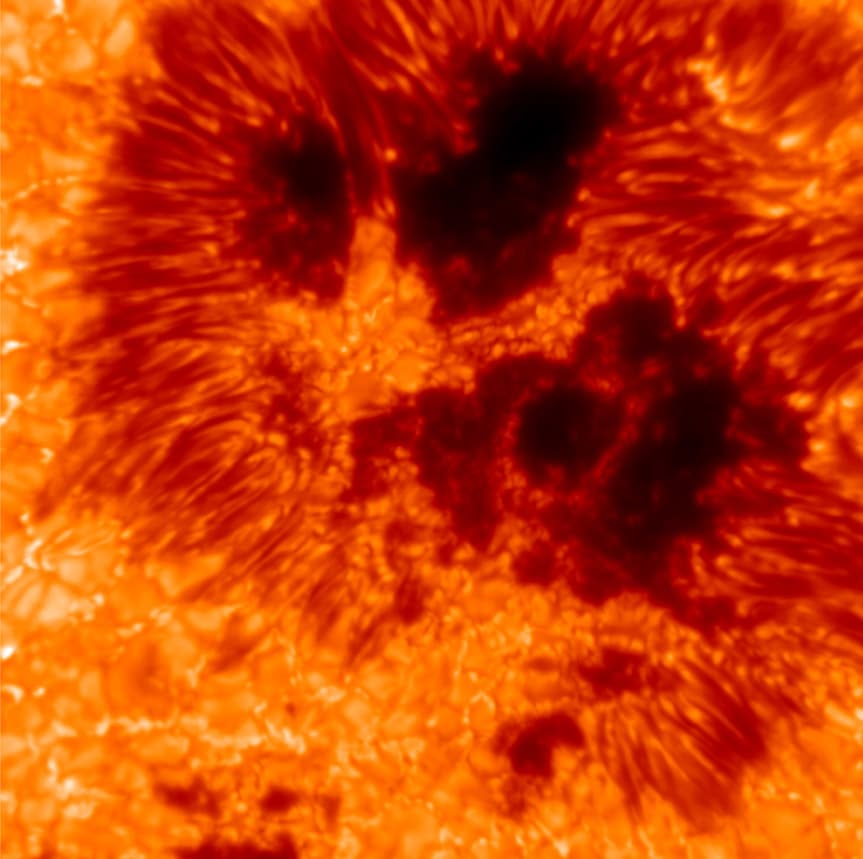 The full image of the sunspot revealed many bright cells around long thin darker structure around the dark potato shaped regions of the actual spots The full image of the sunspot revealed many bright cells around long thin darker structure around the dark potato shaped regions of the actual spots