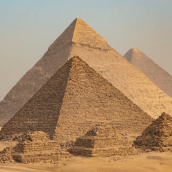 Egypt. Cairo - Giza. General view of pyramids from the Giza Plateau (three pyramids known as Queens' Pyramids on front side; next in order from left: the Pyramid of Menkaure, Khafre and Chufu