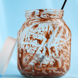An empty jar of chocolate spread.