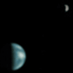 Earth and the Moon as seen from Martian orbit by NASA's NASA Global Surveyor. Note how only about half the side we can see is illuminated.