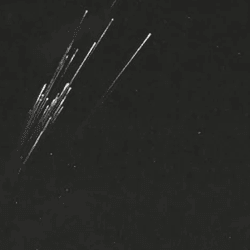broken satelites burn like meteors in the sky at night. 