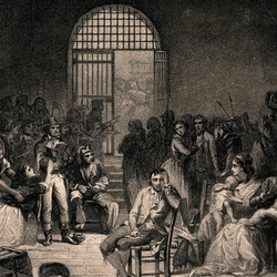 Black and White etching: During the French Revolution, a prisoner sits in the middle of a crowded prison room as a woman nearby pleads with an official. Aquatint and etching by A. Riffaut after Ch. Muller. 