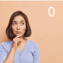 Woman staring throughtfully at the number zero